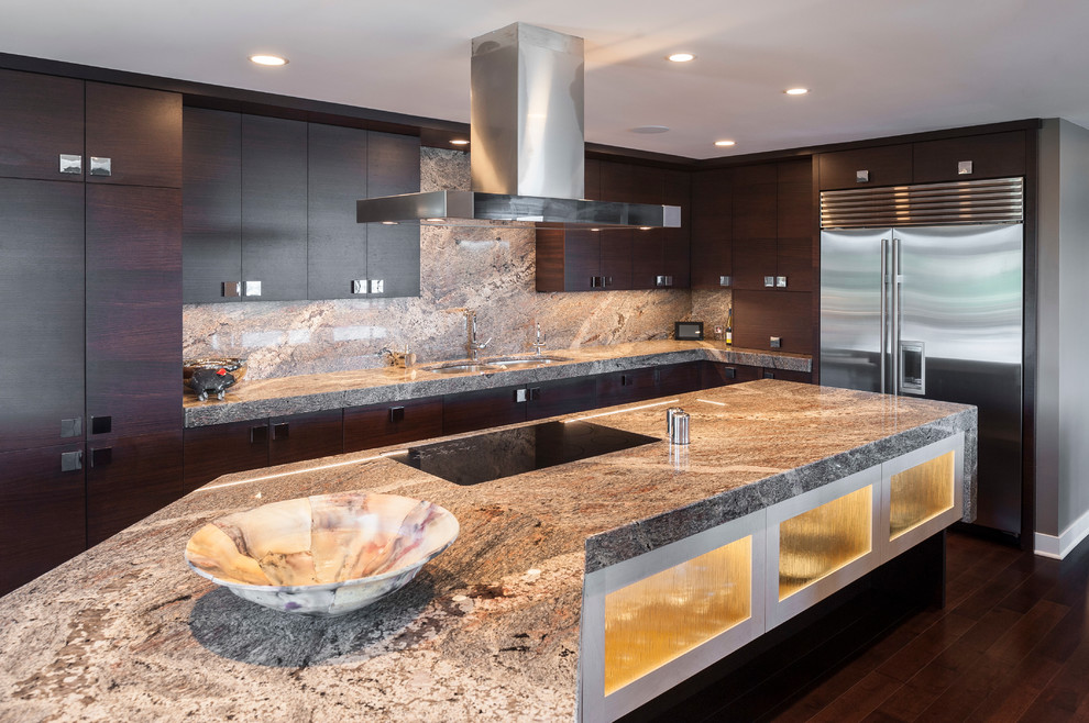 Photo of a large contemporary l-shaped kitchen pantry in Cincinnati with a double-bowl sink, flat-panel cabinets, dark wood cabinets, granite benchtops, multi-coloured splashback, stone slab splashback, stainless steel appliances, dark hardwood floors, with island and brown floor.
