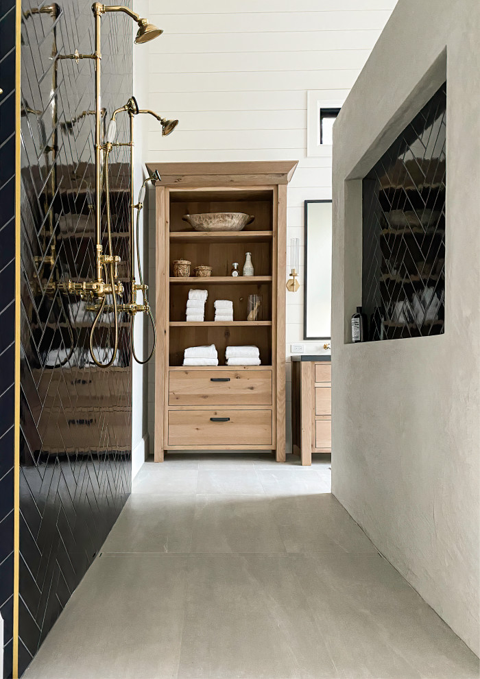 Inspiration for a large country master bathroom in San Francisco with flat-panel cabinets, light wood cabinets, an open shower, blue tile, ceramic tile, white walls, porcelain floors, an undermount sink, granite benchtops, grey floor, an open shower, black benchtops, a double vanity and a freestanding vanity.