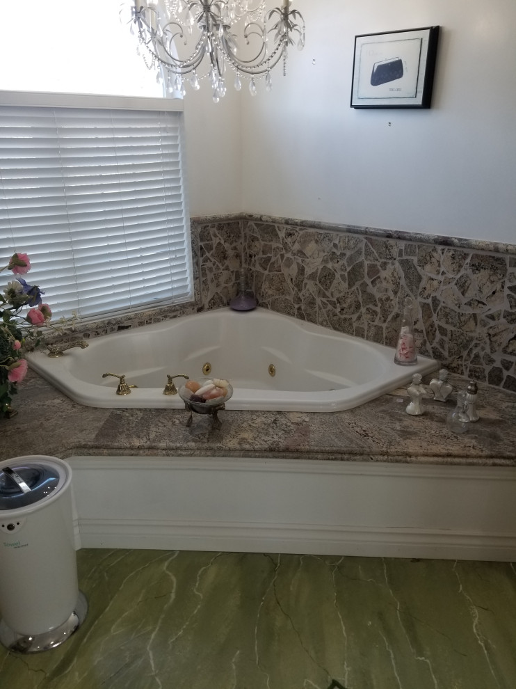 Design ideas for a large traditional master bathroom with an open shower, a one-piece toilet, green walls, a vessel sink, granite benchtops, green floor, an open shower and multi-coloured benchtops.