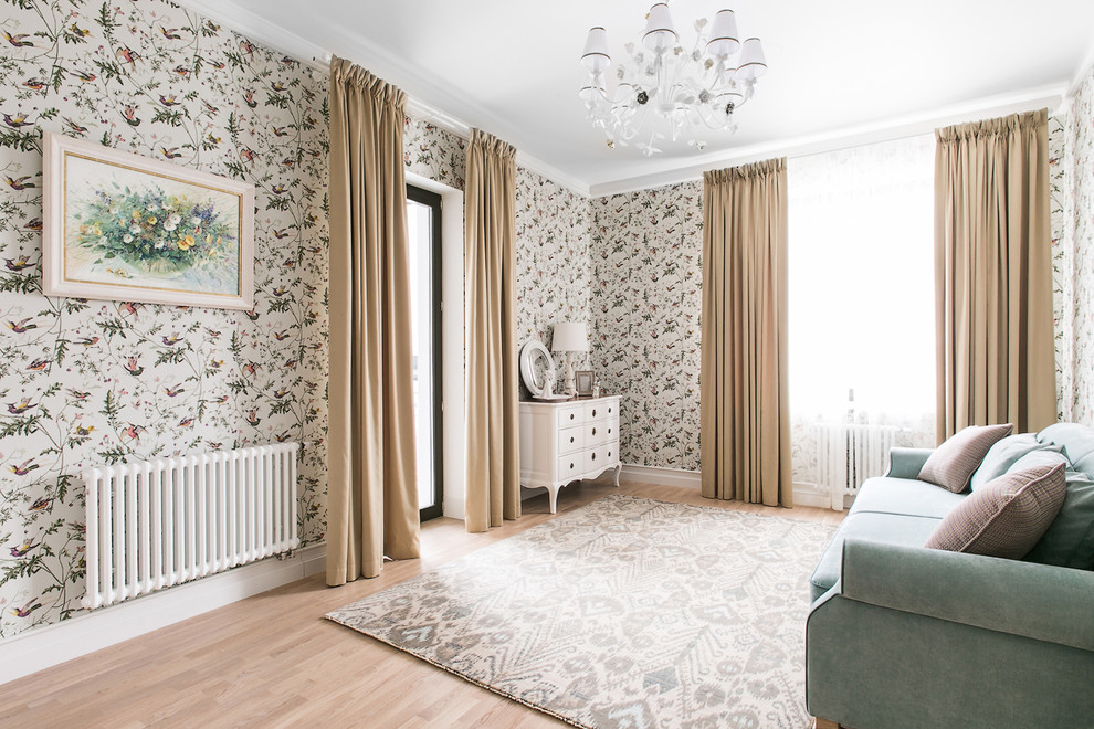 Design ideas for a traditional bedroom in Saint Petersburg with light hardwood floors.