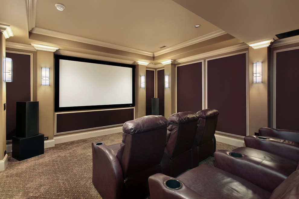 Large traditional enclosed home theatre in Dallas with a projector screen.