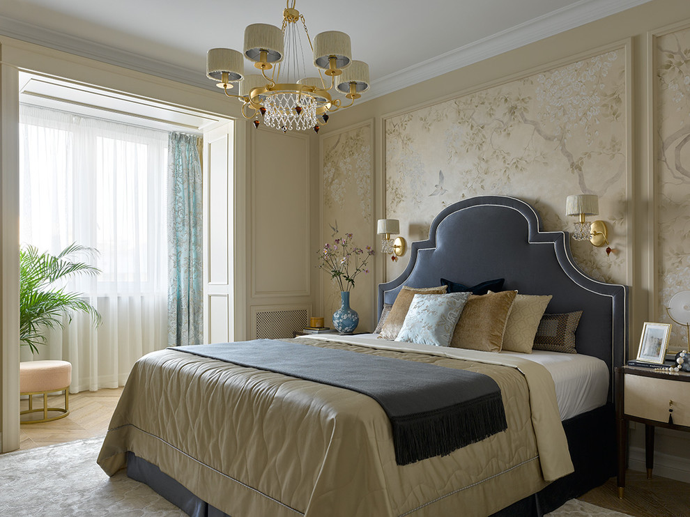 Design ideas for a traditional master bedroom in Moscow with beige walls, light hardwood floors and beige floor.