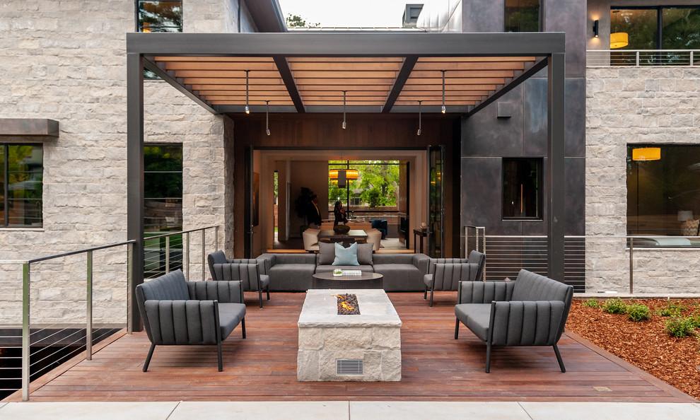 Photo of a contemporary deck in Orange County with a pergola.
