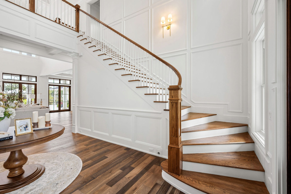 Example of a french country staircase design in Atlanta