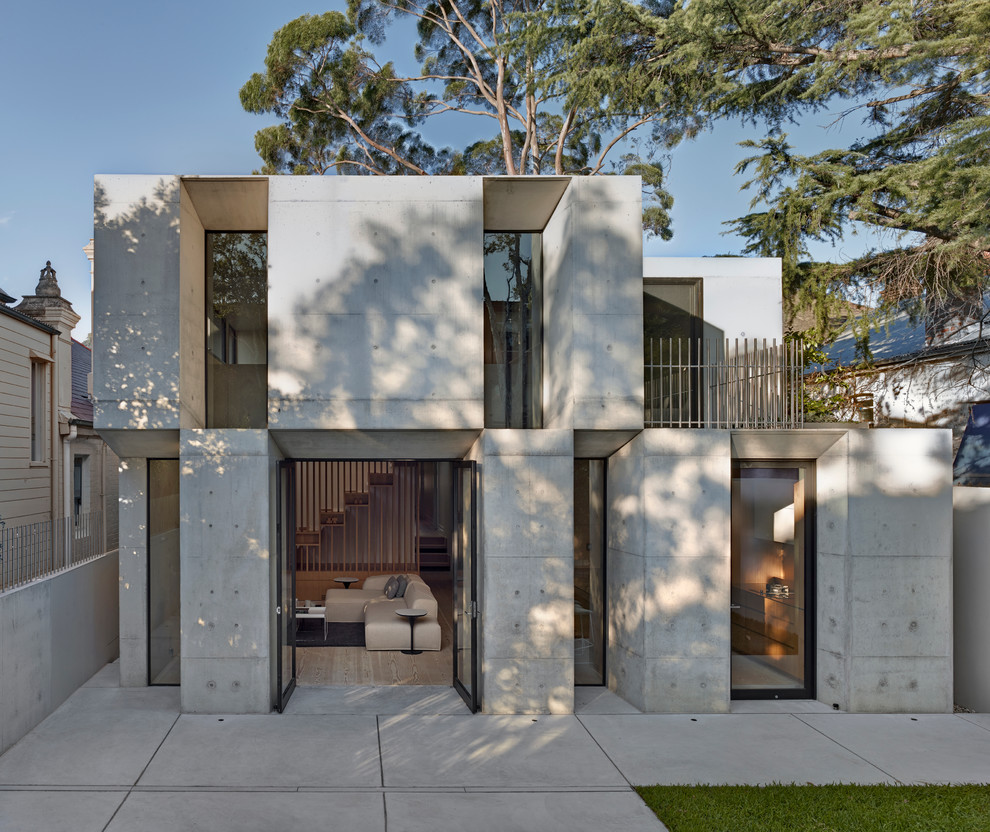 Inspiration for a contemporary concrete exterior in Sydney.