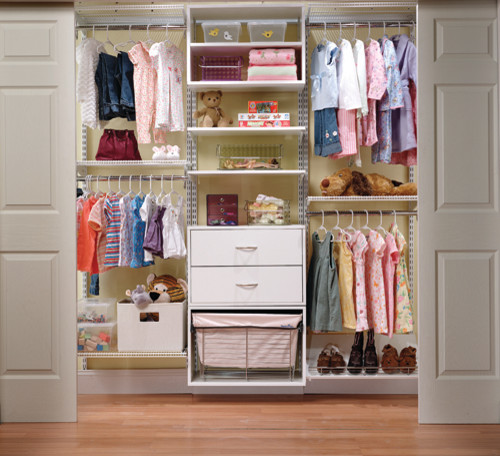This is an example of a modern storage and wardrobe in Cincinnati.
