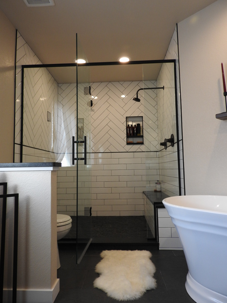 Example of a transitional bathroom design in Denver