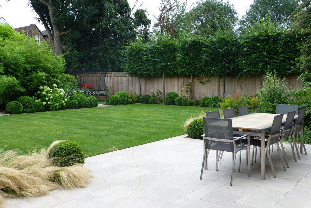 Contemporary patio in London with no cover.