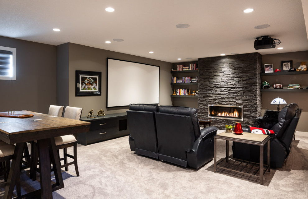 Photo of a large contemporary fully buried basement in Calgary with a game room, grey walls, carpet, a ribbon fireplace and beige floor.