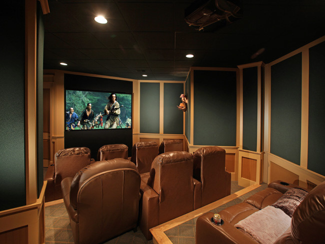 Inspiration for a large traditional enclosed home theatre in Atlanta with green walls, carpet, a projector screen and multi-coloured floor.