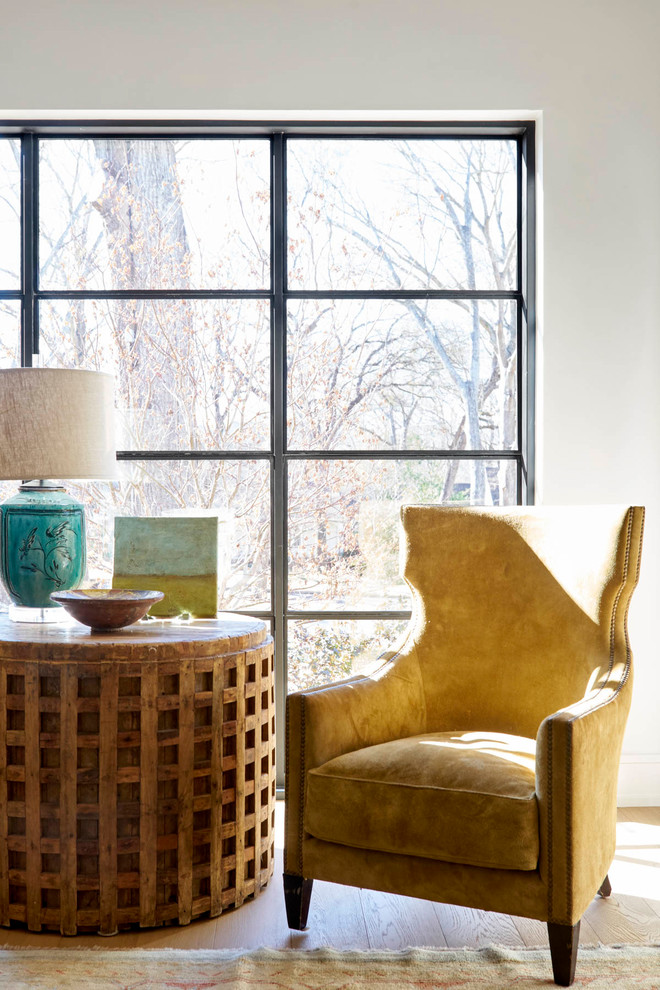 Inspiration for a mid-sized rustic open concept and formal light wood floor and beige floor living room remodel in Dallas with white walls, no fireplace and no tv