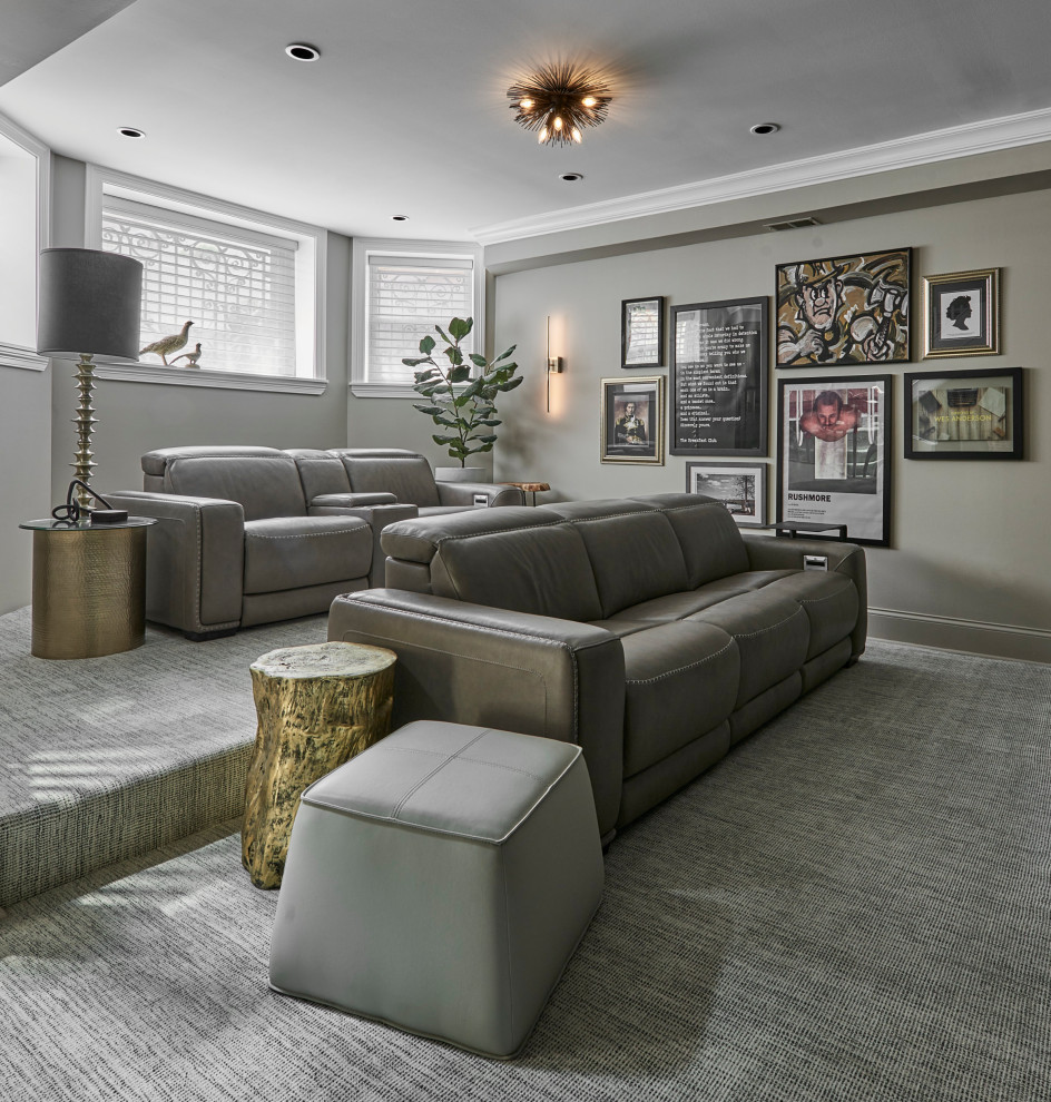 Large transitional open concept home theatre in Chicago with black walls, carpet, a wall-mounted tv and grey floor.