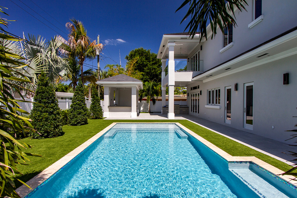 Home design - large transitional home design idea in Miami