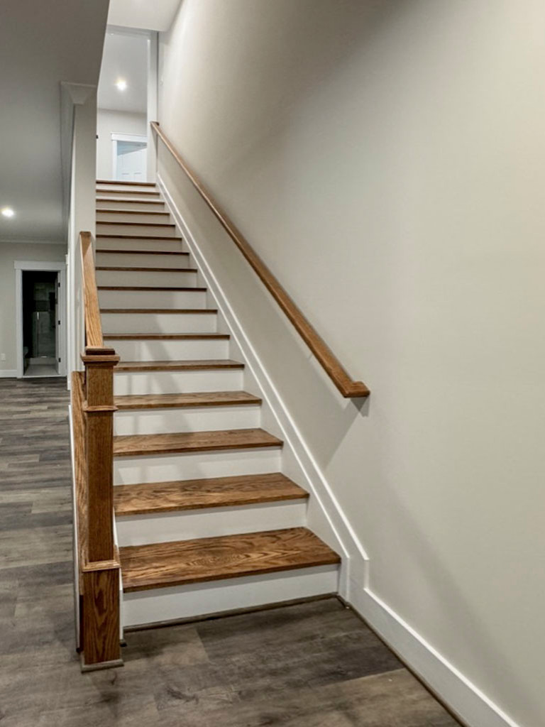 117_Distinct Oak Staircase with Iron Balusters & Oak Rail Profile, Chantilly VA