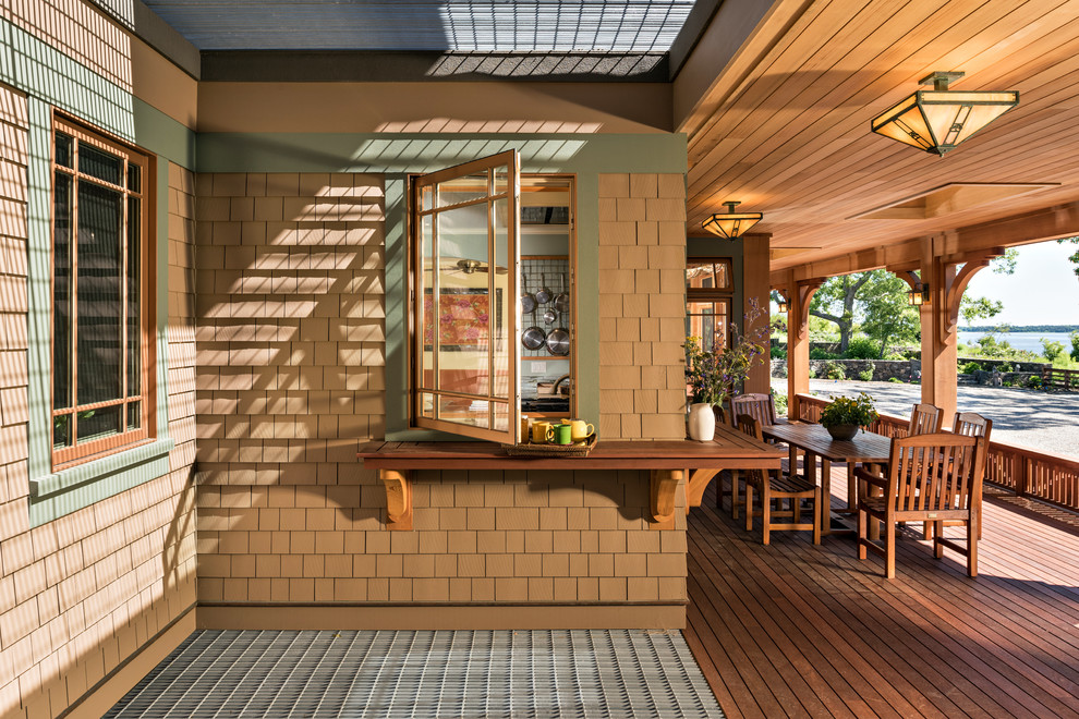 Inspiration for an arts and crafts verandah in Boston with a roof extension.