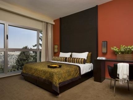 Photo of a mediterranean bedroom in Other with carpet.