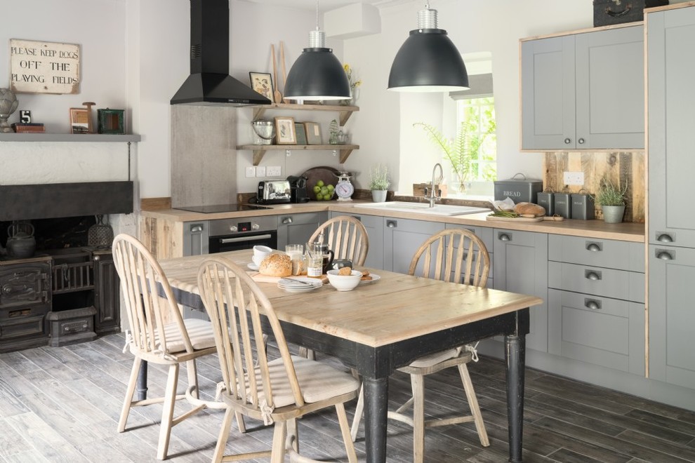 Design ideas for a small country eat-in kitchen in Glasgow with grey floor.