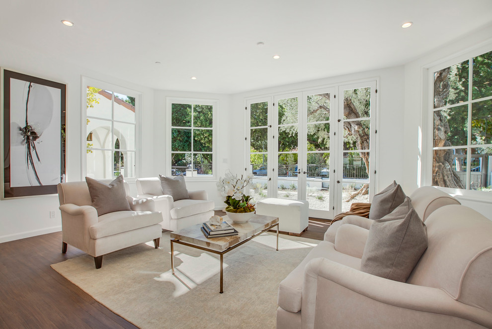Photo of a transitional formal open concept living room in Los Angeles with white walls, no fireplace and no tv.