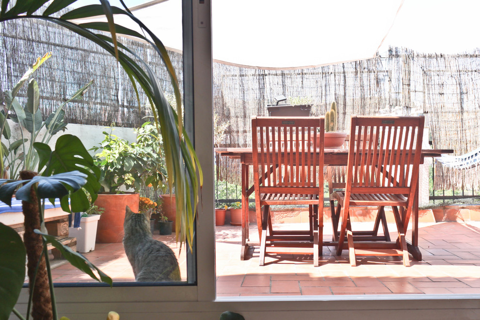 Diseño de terraza contemporánea de tamaño medio