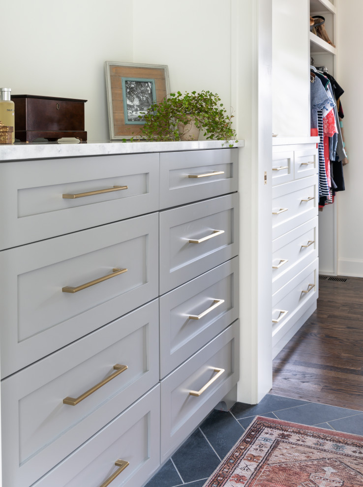 Design ideas for a large transitional storage and wardrobe in Nashville with shaker cabinets, white cabinets, slate floors and black floor.