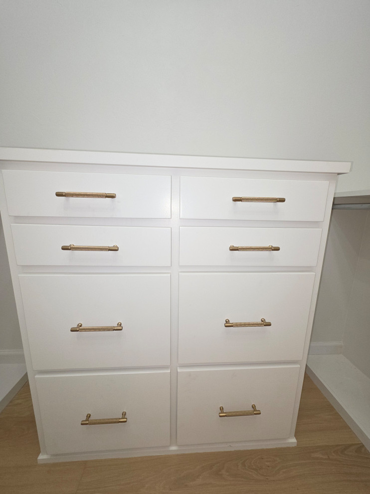 Custom cabinets with golden hardware