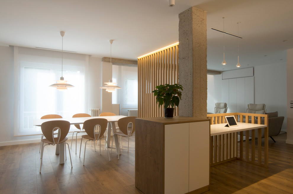 This is an example of a large scandinavian open plan dining in Other.