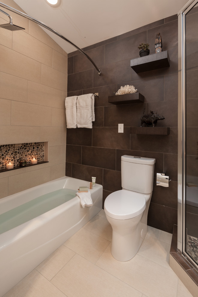 Inspiration for a large transitional master porcelain tile porcelain tile and beige floor corner shower remodel in Minneapolis with a two-piece toilet, brown walls and a hinged shower door