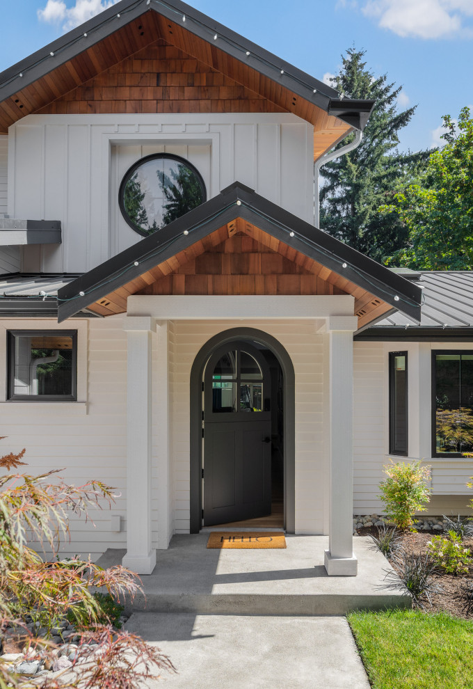 Modern Farmhouse Front Porch with Round Window