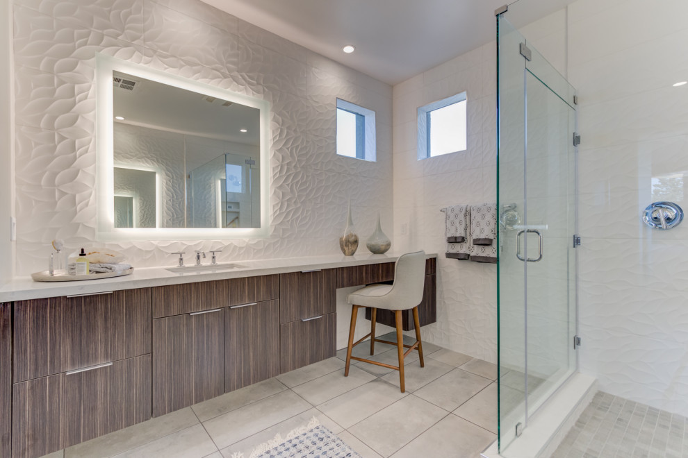 Example of a master single-sink alcove shower design in San Francisco with flat-panel cabinets, a two-piece toilet, white walls, an undermount sink, a hinged shower door and a built-in vanity
