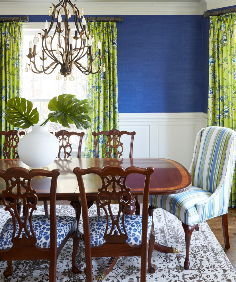 Traditional dining room in Houston with blue walls.