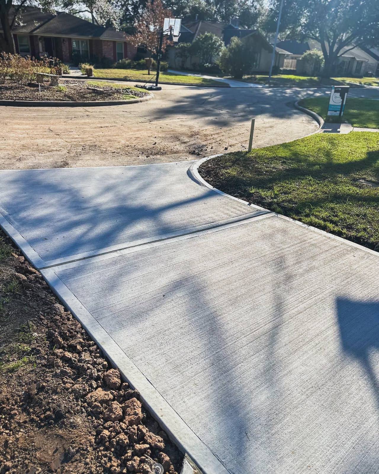 New driveway with sidewalks and stamped concrete!