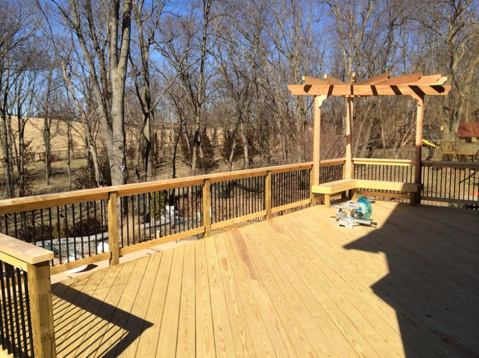 Mid-sized backyard balcony deck photo with no cover
