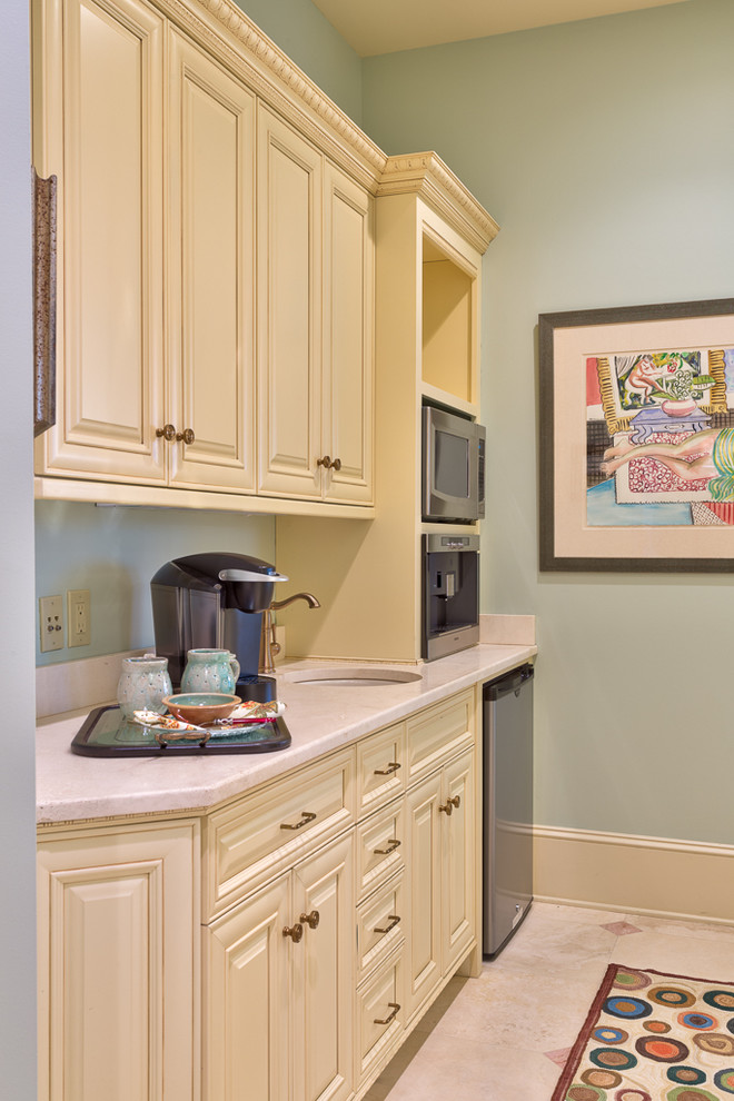 Small mountain style galley enclosed kitchen photo in Charlotte with a single-bowl sink, stainless steel appliances and no island