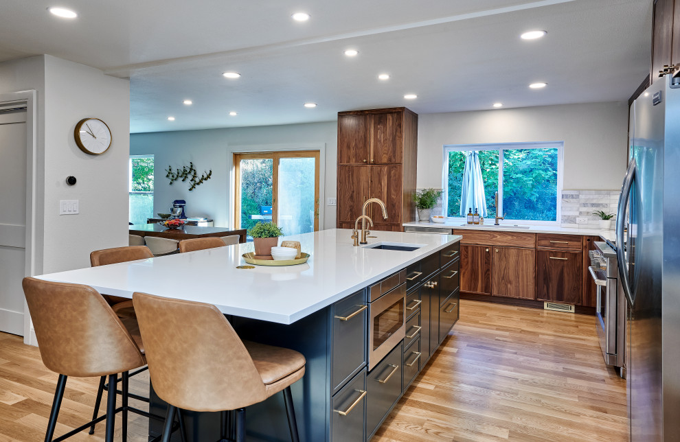 Example of a transitional kitchen design in Denver