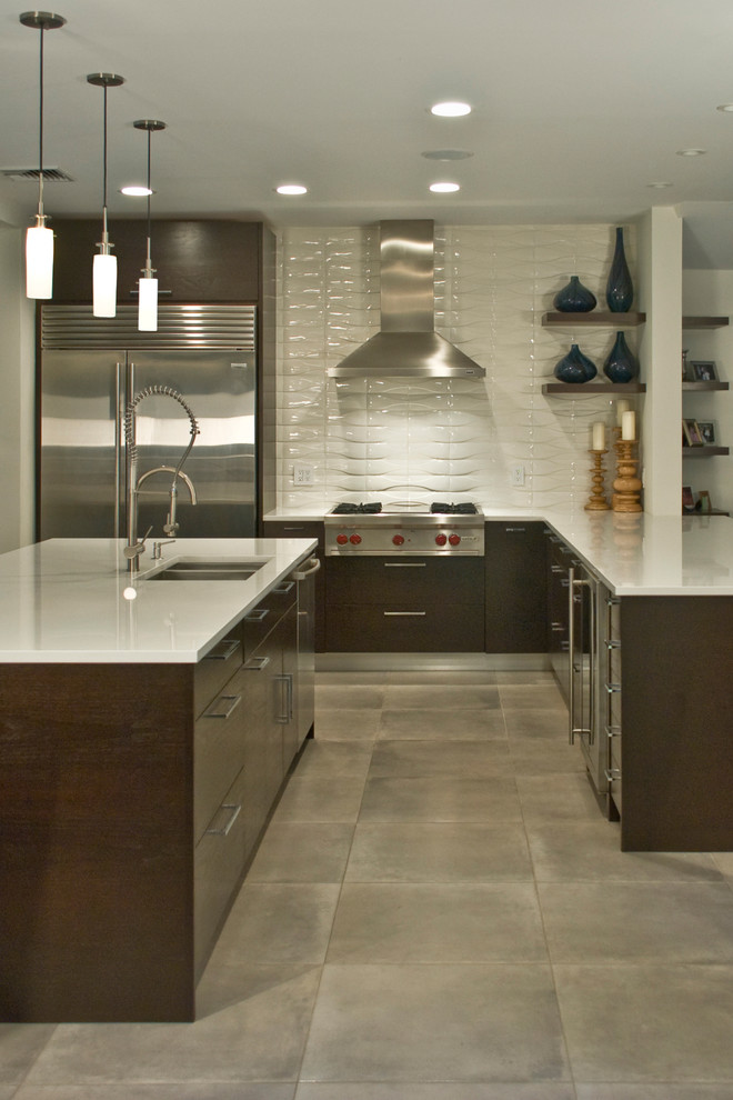 This is an example of a contemporary kitchen in San Diego with stainless steel appliances.