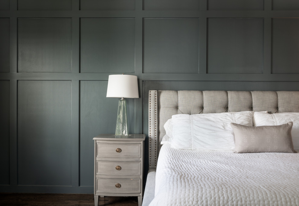 Inspiration for a large transitional master bedroom in Nashville with blue walls, dark hardwood floors, brown floor and decorative wall panelling.