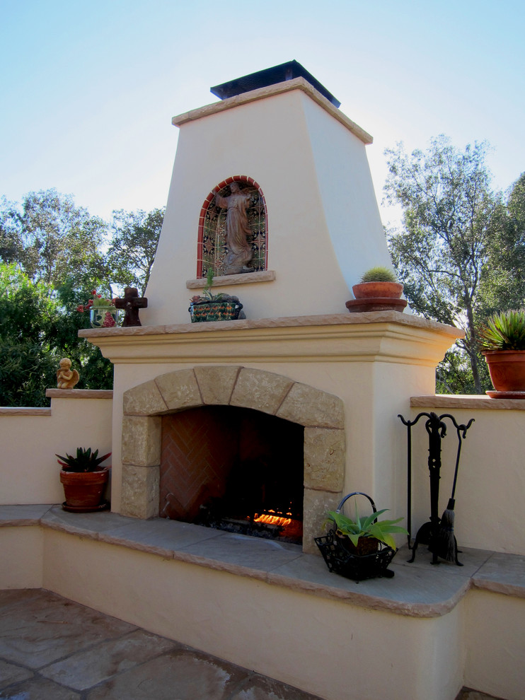 Spanish Style Outdoor Fireplace In Santa Barbara Mediterranean