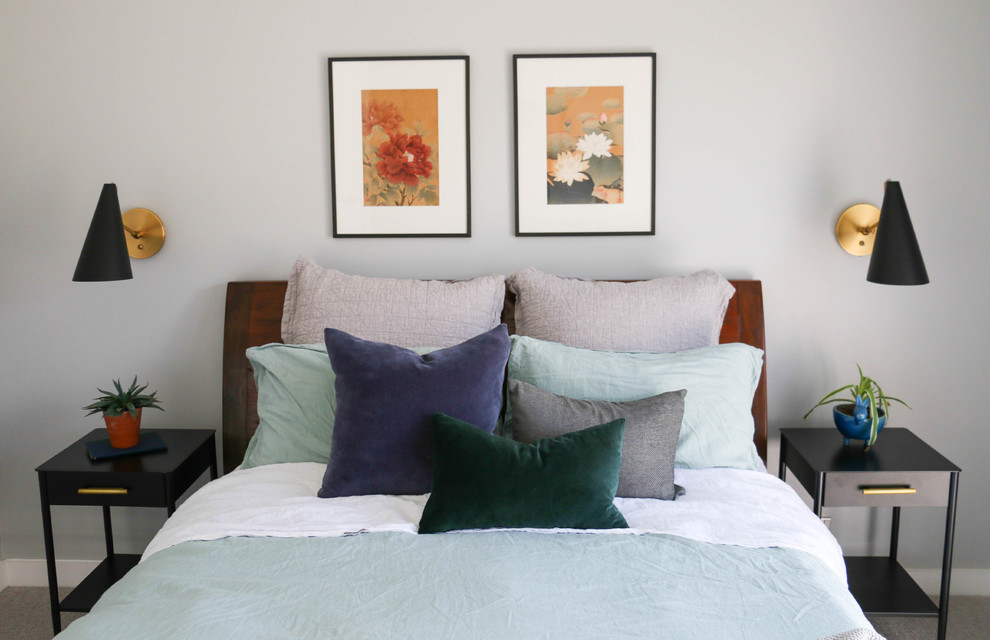 Photo of a mid-sized midcentury master bedroom in Sydney with grey walls, carpet and grey floor.