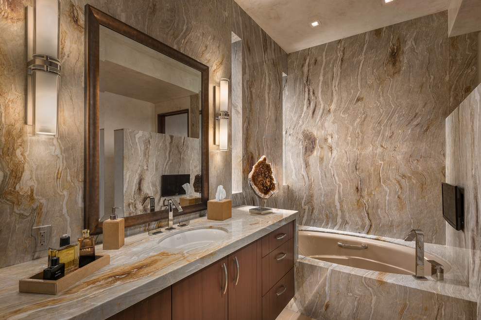 Photo of a large contemporary master bathroom in Phoenix with flat-panel cabinets, medium wood cabinets, an undermount tub, an undermount sink and granite benchtops.
