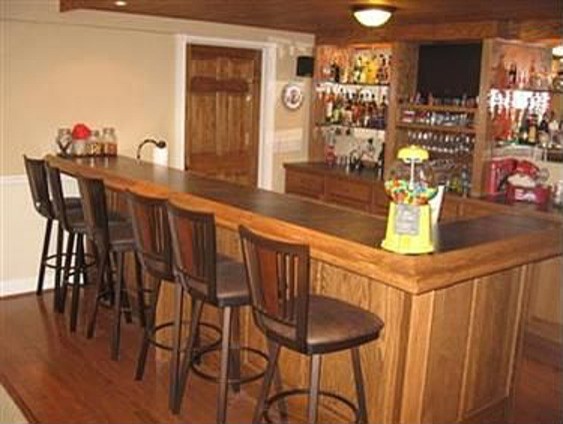 Large traditional home bar in Cleveland.
