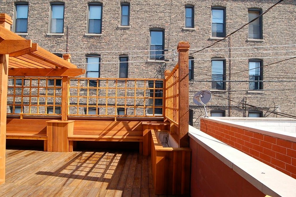 Deck - large transitional rooftop deck idea in Chicago with decking
