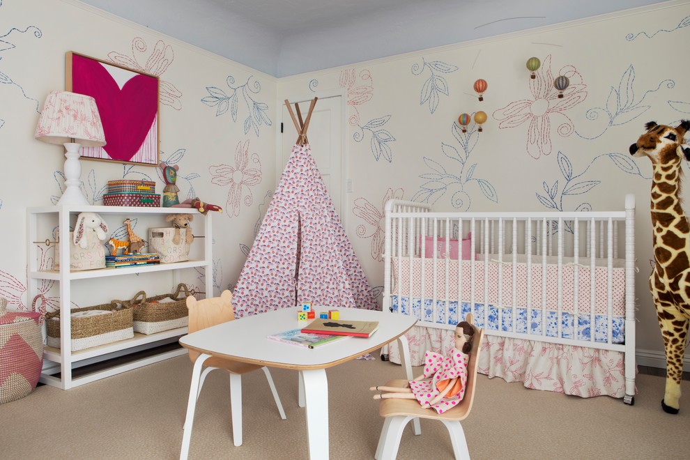 Design ideas for a mid-sized transitional nursery for girls in Los Angeles with multi-coloured walls, dark hardwood floors and brown floor.
