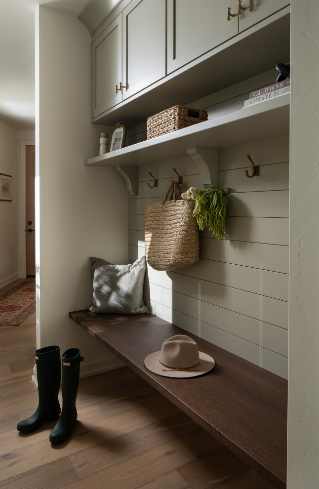 Inspiration for a coastal entryway remodel in Milwaukee
