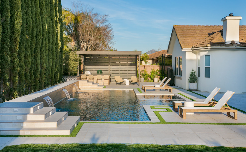 Design ideas for a contemporary rectangular swimming pool in San Diego with a bbq area.