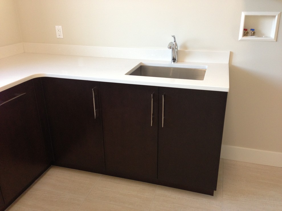Design ideas for a contemporary laundry room in Edmonton.