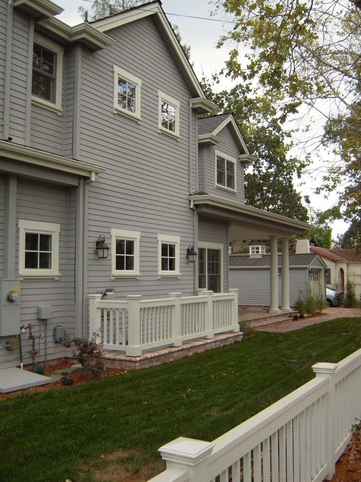 Design ideas for a large country two-storey grey exterior in San Francisco with wood siding.