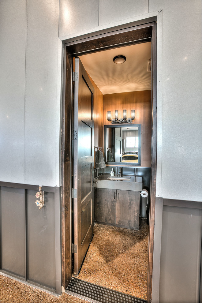 Inspiration for a mid-sized rustic 3/4 multicolored tile and matchstick tile slate floor alcove shower remodel in Denver with flat-panel cabinets, dark wood cabinets, a two-piece toilet, beige walls, an undermount sink and solid surface countertops