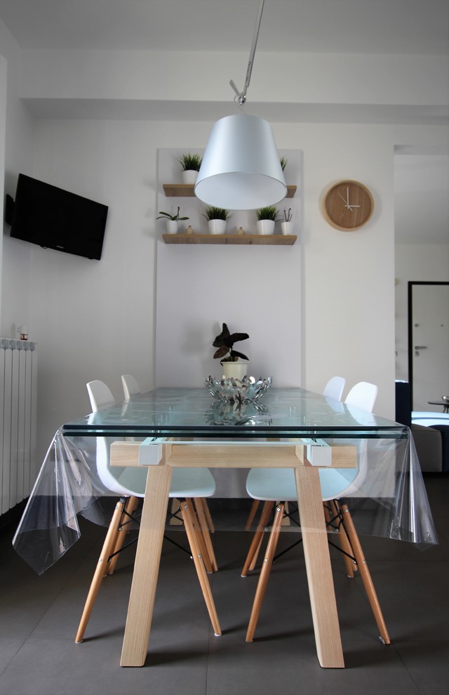 Photo of a contemporary dining room in Catania-Palermo with beige walls.