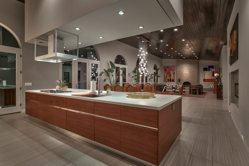 Design ideas for an expansive contemporary open plan kitchen in Omaha with an undermount sink, flat-panel cabinets, medium wood cabinets and with island.