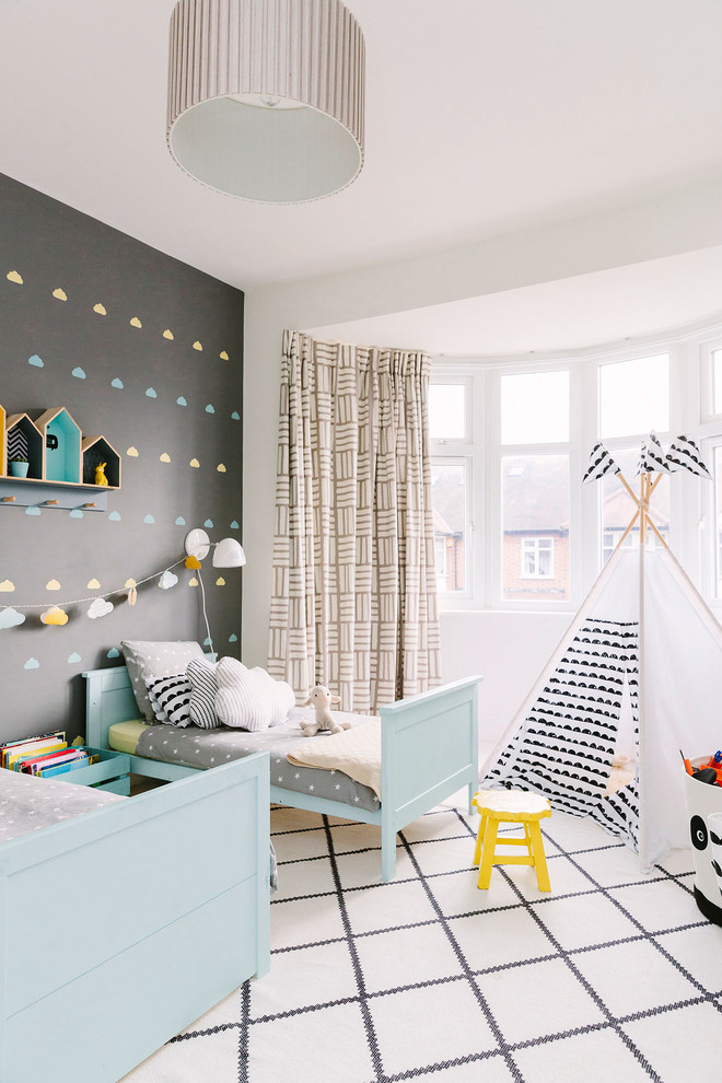 Modern gender-neutral kids' bedroom in London with grey walls for kids 4-10 years old.